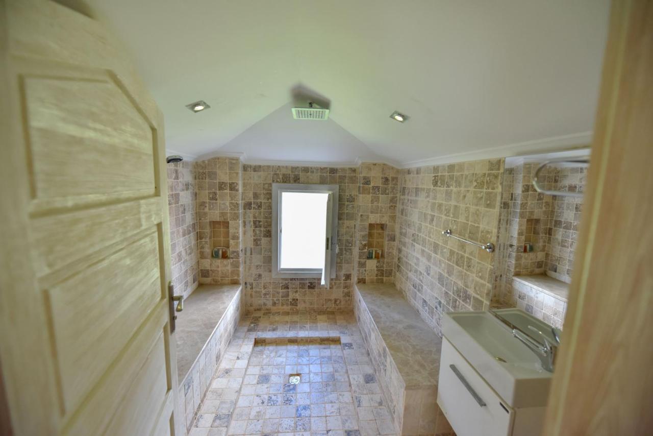Orino Suites Cedit Bagian luar foto