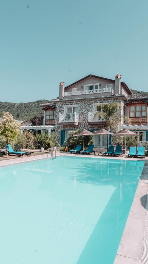 Orino Suites Cedit Bagian luar foto