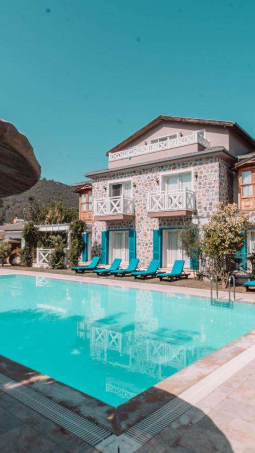 Orino Suites Cedit Bagian luar foto