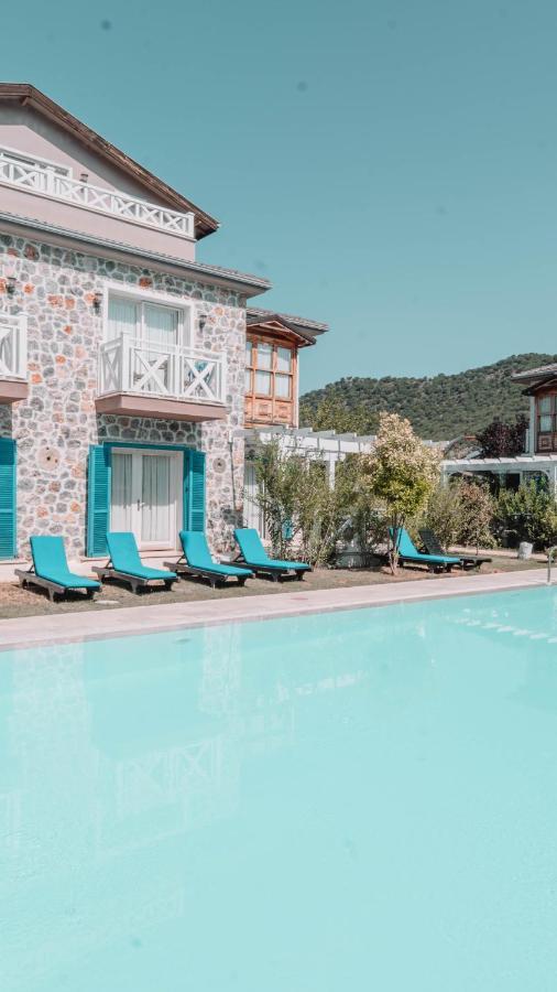 Orino Suites Cedit Bagian luar foto