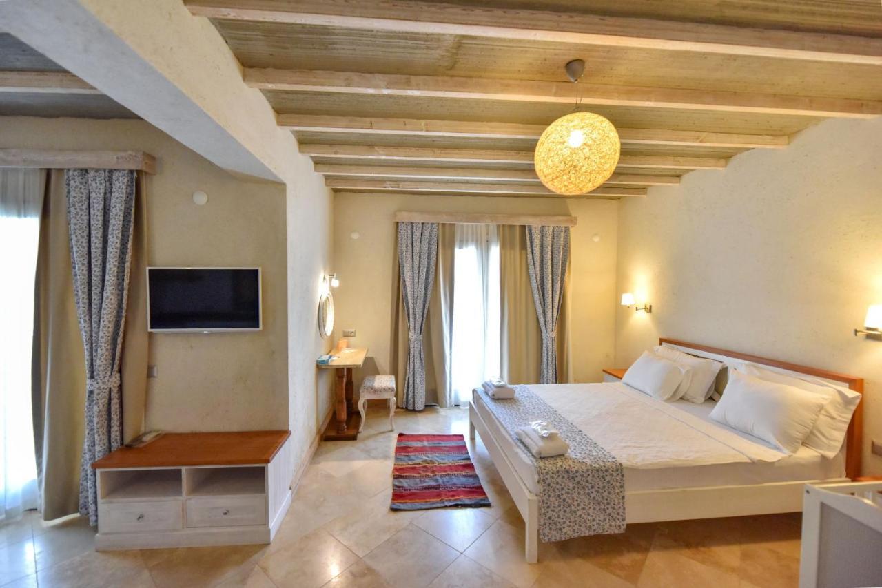 Orino Suites Cedit Bagian luar foto