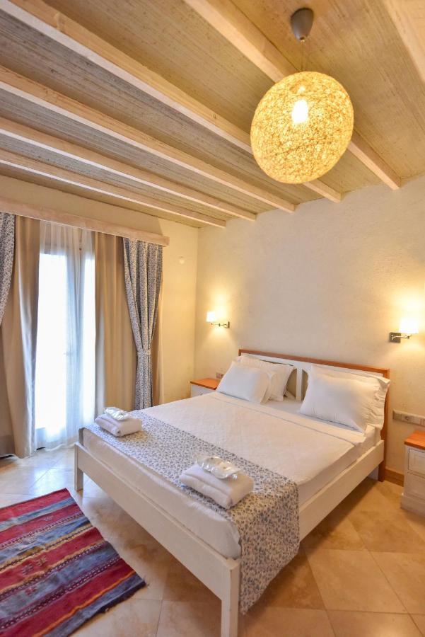 Orino Suites Cedit Bagian luar foto