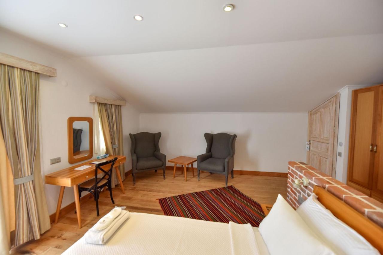 Orino Suites Cedit Bagian luar foto