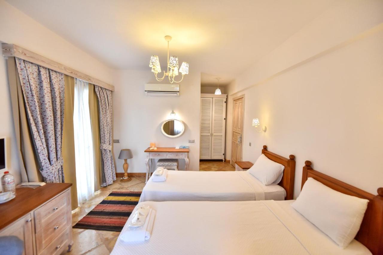 Orino Suites Cedit Bagian luar foto